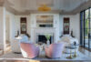 Grand living room with steel-framed windows, coastal interiors, and nautical design elements in a Westchester heritage home.