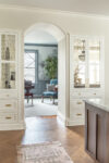 Elegant doorway connecting kitchen and dining room with cohesive design elements, natural light, and refined finishes by a Westfield NJ interior designer.