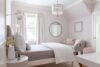 Bright children’s bedroom with cheerful textiles and Victorian-inspired detailing in a renovated Westfield NJ farmhouse.