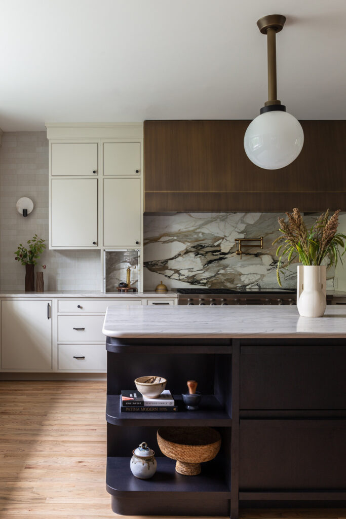 Built-in shelving on the kitchen island of a Summit New Jersey Colonial Farmhouse